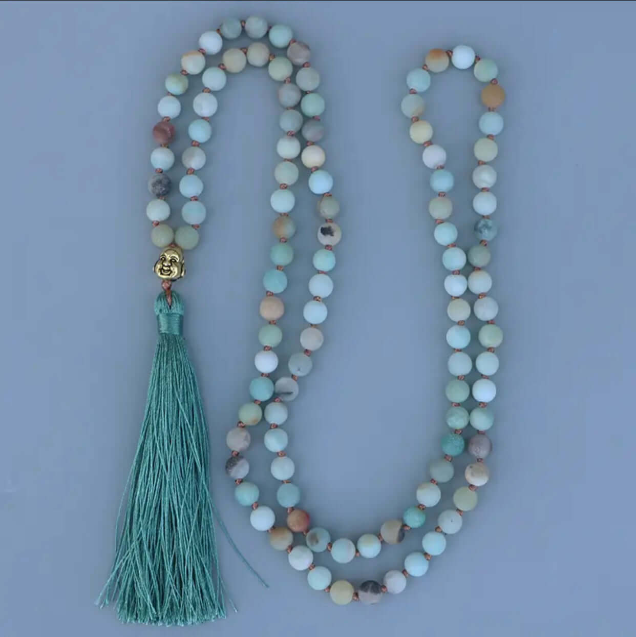 Collar Mala de Amazonita y Buda: Un símbolo de calma y equilibrio