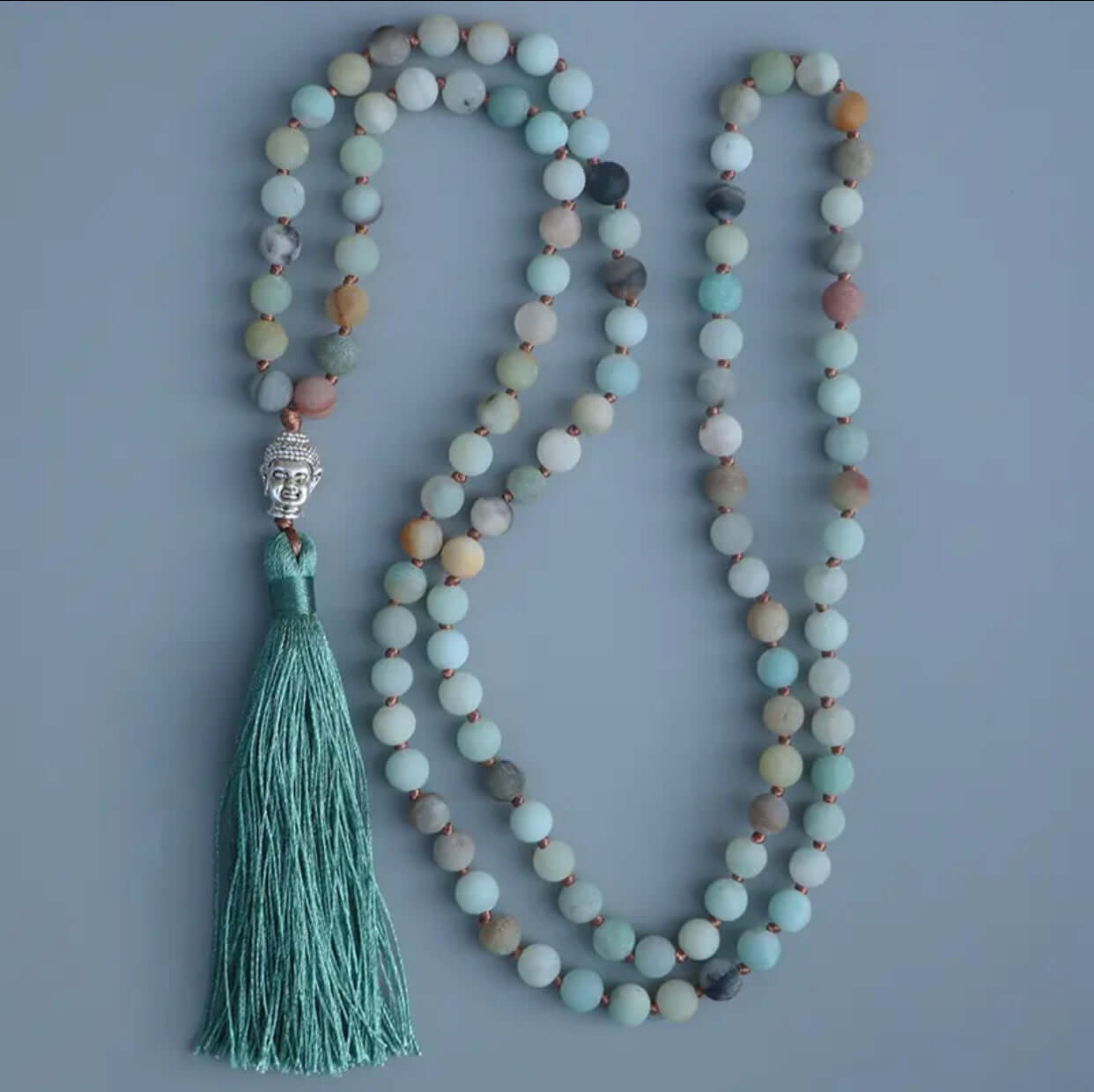Collar Mala de Amazonita y Buda: Un símbolo de calma y equilibrio